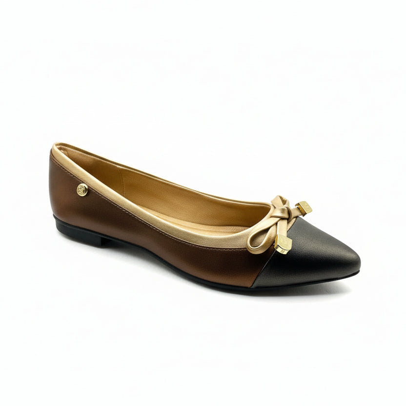 A pair of brown metallic Tasha Ballerina flats with a strap and buckle closure.