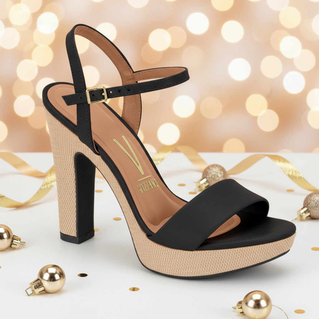 Black high-heeled sandal with beige sole .