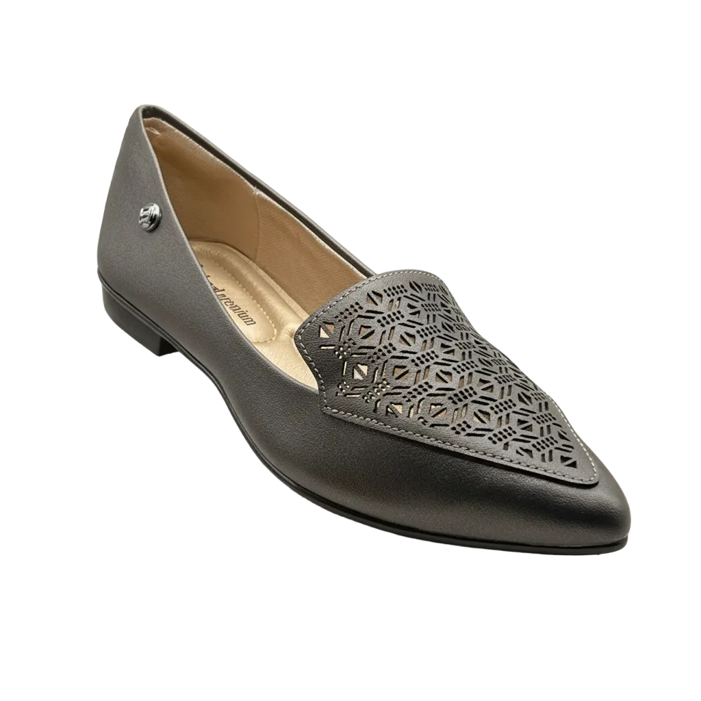 A pair of pewter-colored ballet flats with a geometric pattern on the toe and a flat, sleek sole.