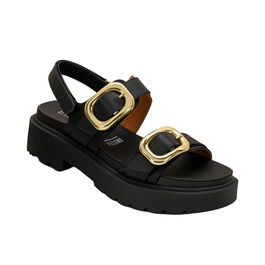 Black sandal with gold buckles.