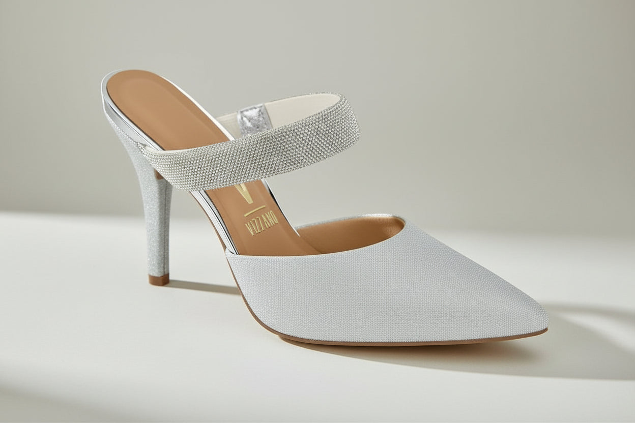 Silver high-heeled shoe with rhinestone.