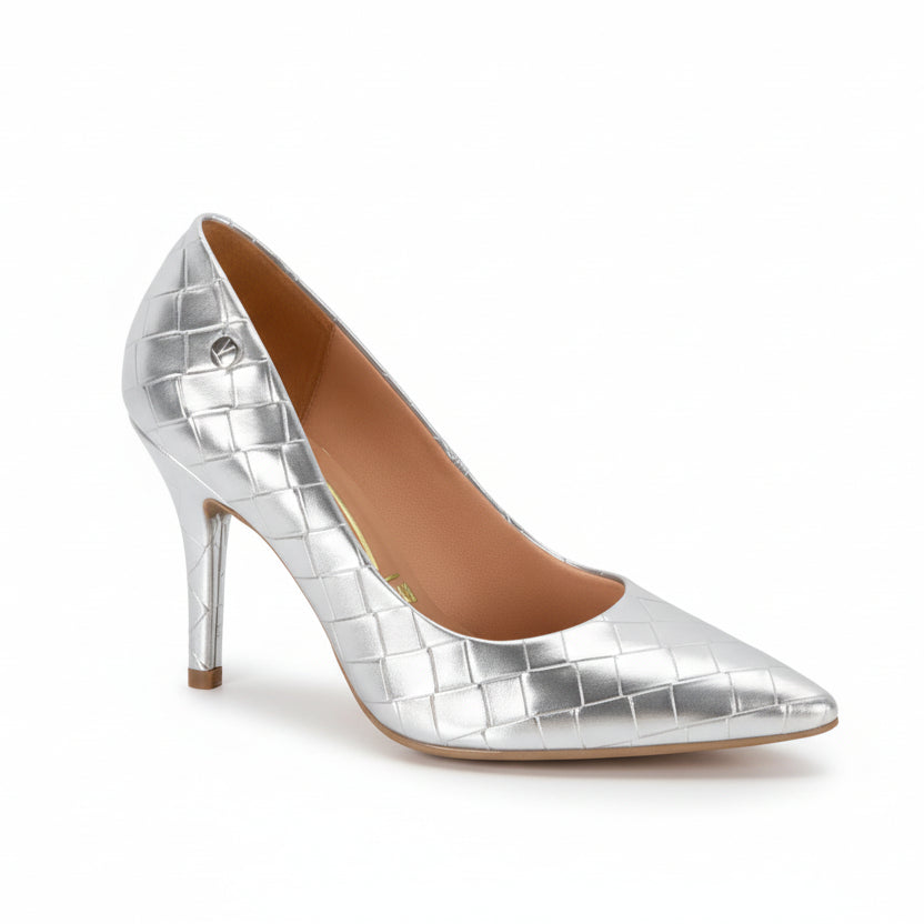 A silver metallic high heel pump with a pointed toe and textured design.