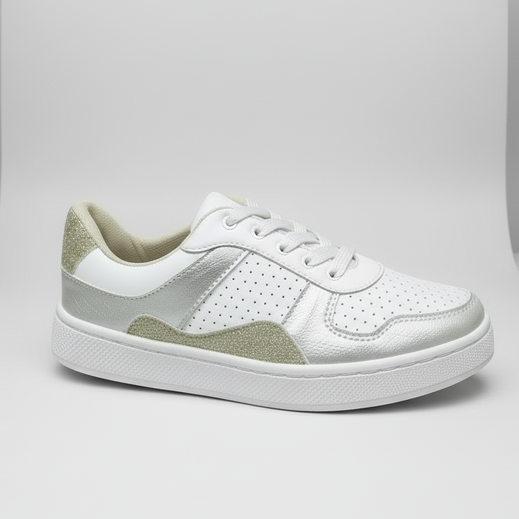 A silver and gold tennis shoe with a white sole.