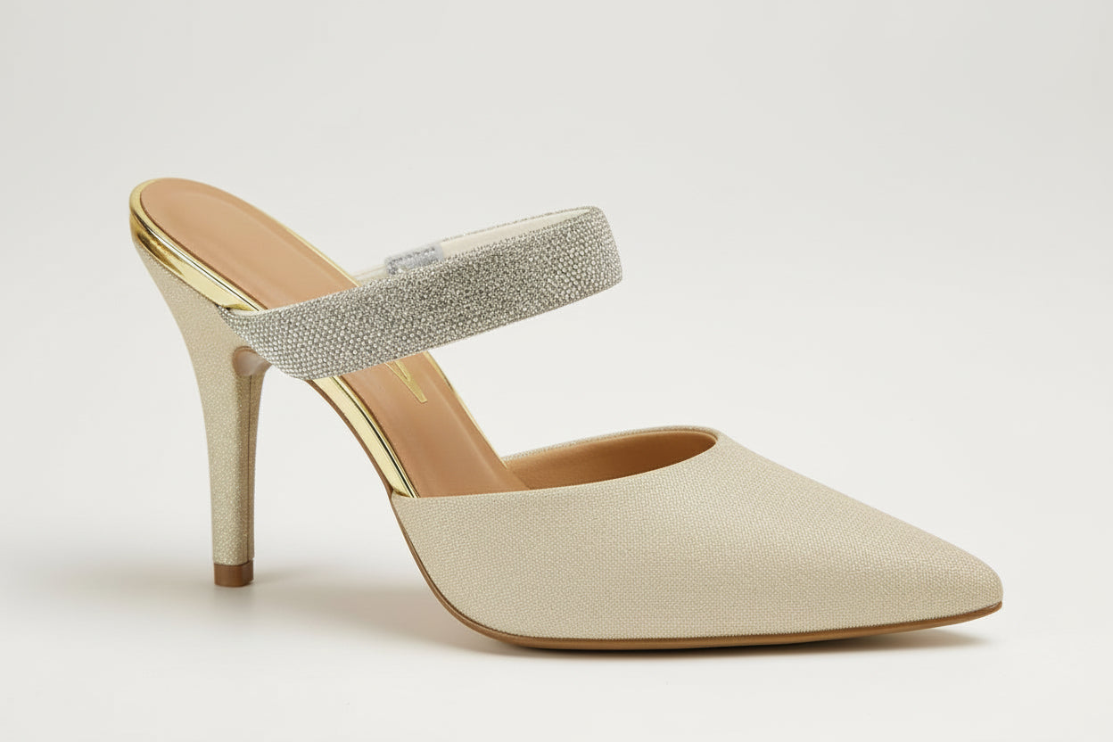 A pair of gold-colored open-toe heeled sandals with a metallic finish and a padded sole.