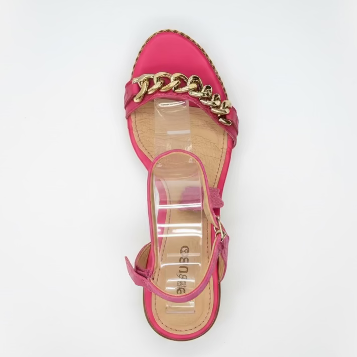 Pink sandal with gold chain detail.