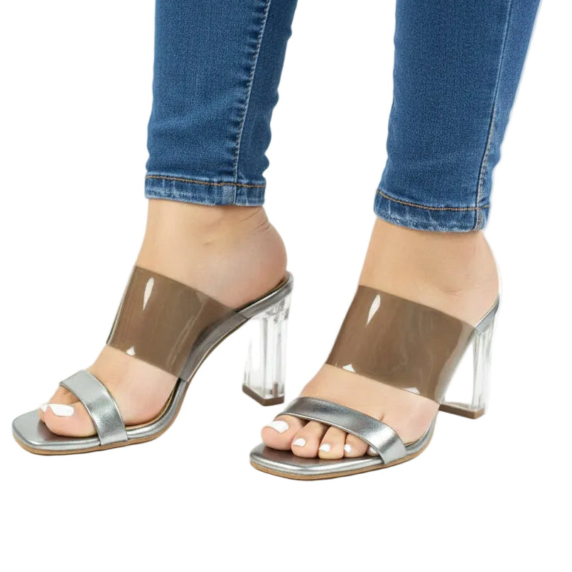 Silver metallic texture heels with clear straps and a clear, chunky heel.