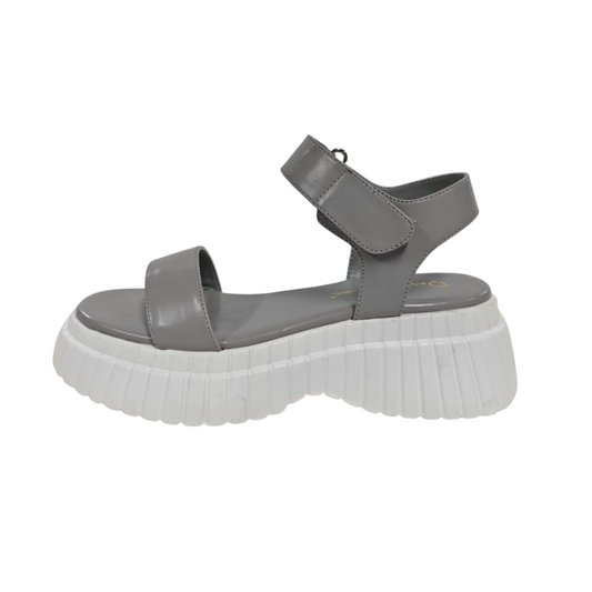 Gray sandal with a thick white sole.