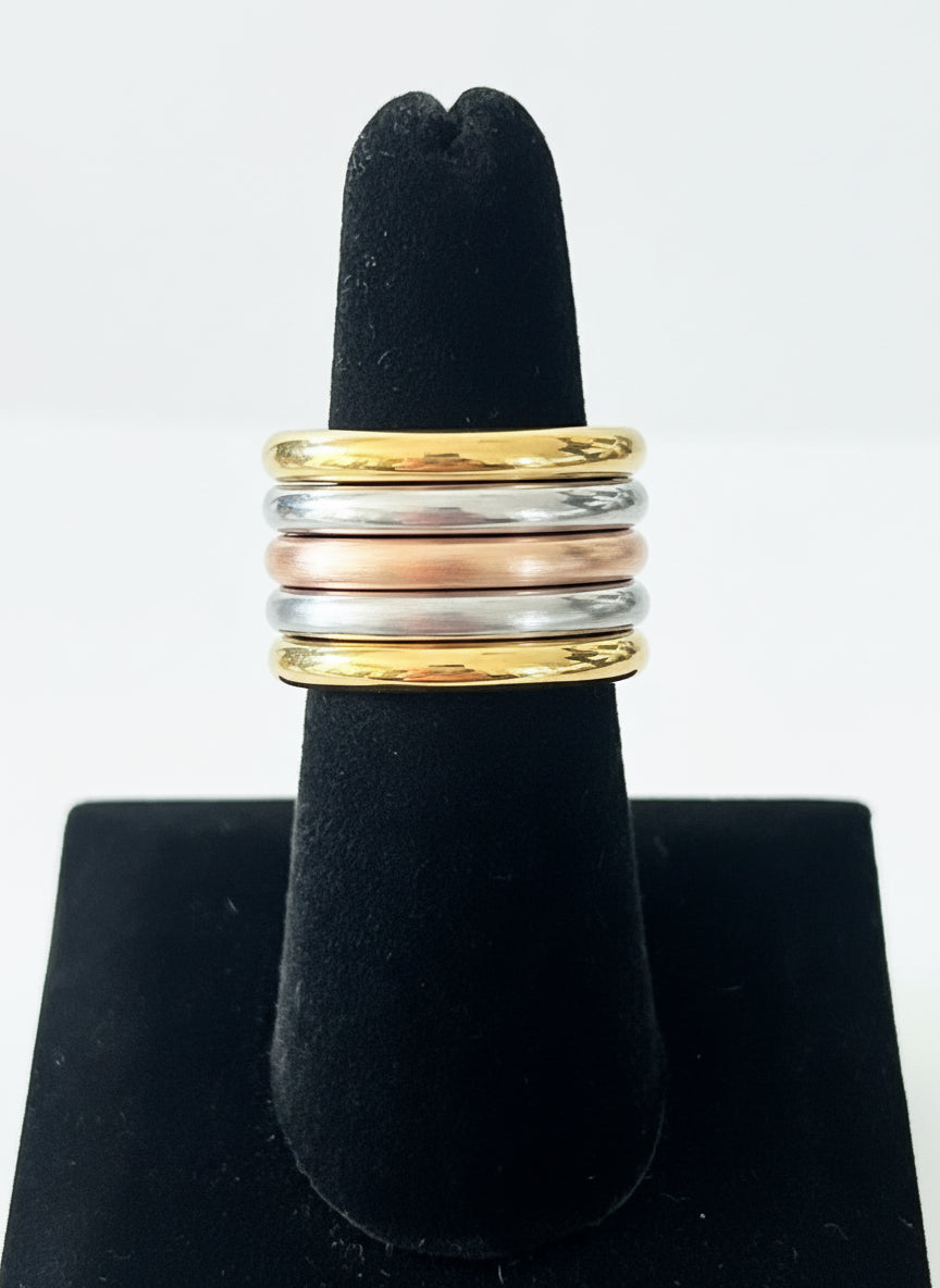 Gold, silver  and rose gold ring.
