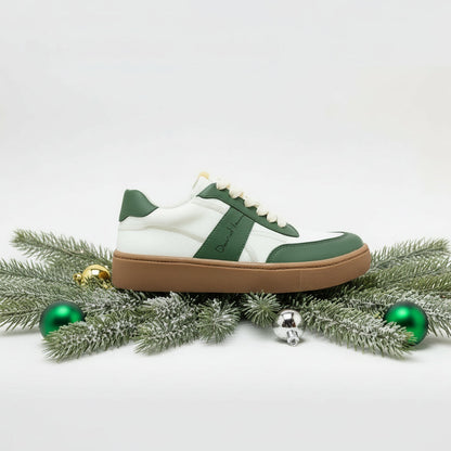 Green and white sneaker with brown accents 